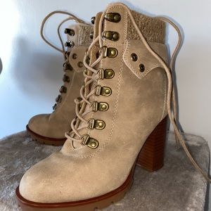 Brown lace up heeled boots